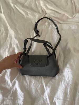 Calvin Klein re-lock bag like new, grey with card compartment