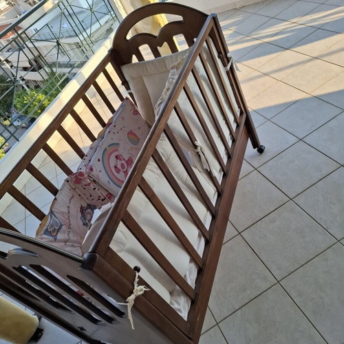Wooden Baby Crib with Wheels and Protective Bumper, Walnut Color
