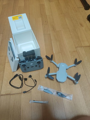 DJI Mini 4K drone with controller and box