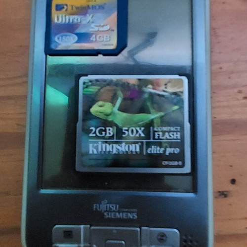 Fujitsu Siemens Pocket LOOX 720 PDA used with GPS tracker and accessories