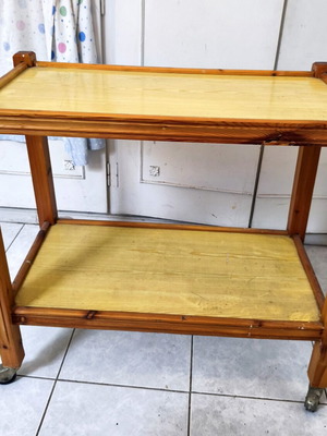 Helper table with shelf and wheels used
