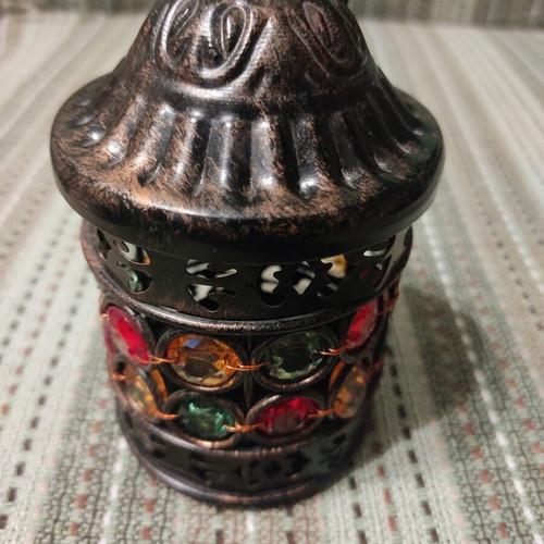 Metal lantern with colorful stones, ethnic style
