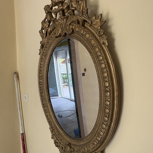 Baroque oval wall mirror with carved plaster frame, used, 104×61 cm