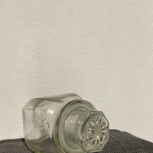 Vintage glass jar with embossed lid like new