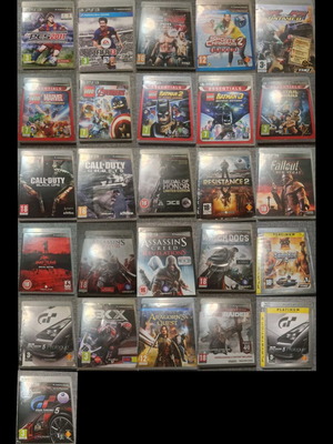 PlayStation 3 pack of 24 used games with 2 empty cases
