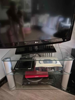 TV stand tempered glass with 3 shelves like new, minimal design
