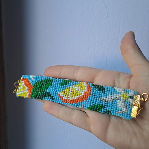 Handmade women's bracelet new with design, blue and yellow