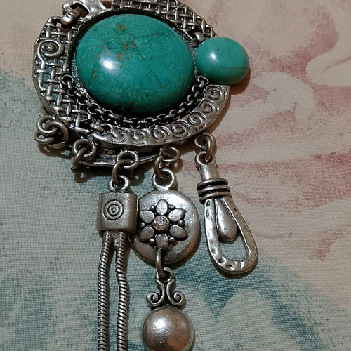 Necklace with turquoise stone, silver color
