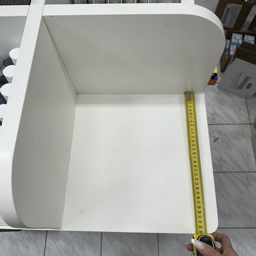 White professional display shelf used for store products