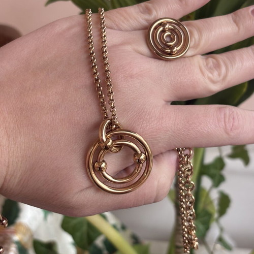 Folli Follie necklace with concentric circles like new, rose gold plated stainless steel