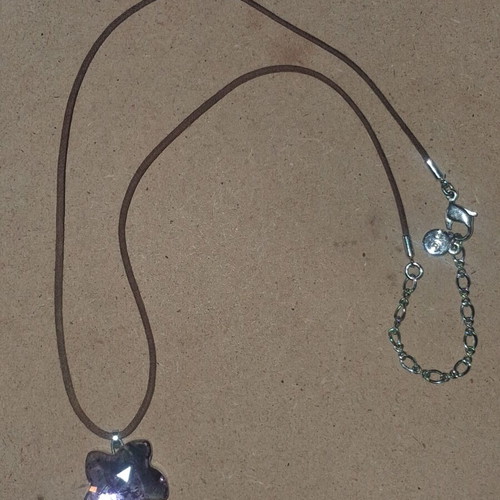 Swarovski vintage flower pendant with brown cord like new