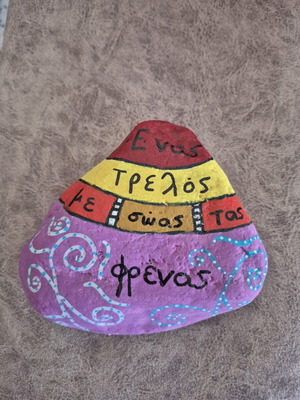 Decorative painted stone with tempera