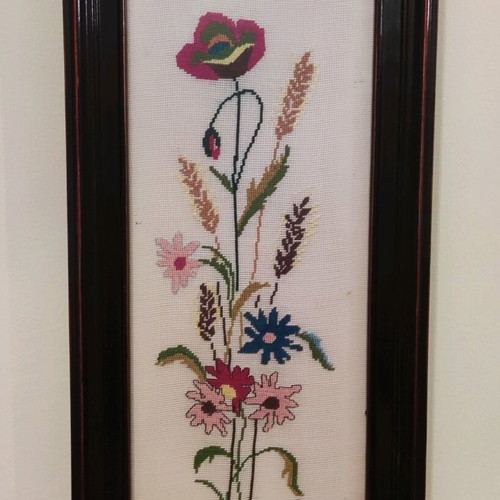 Decorative textile painting with handmade embroidery used, flowers