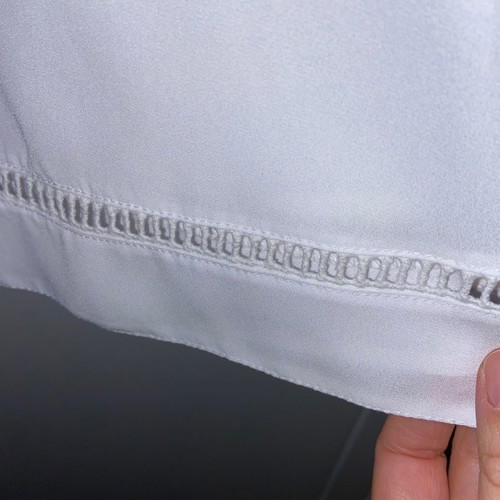 Top white used Danoff one size with perforated details