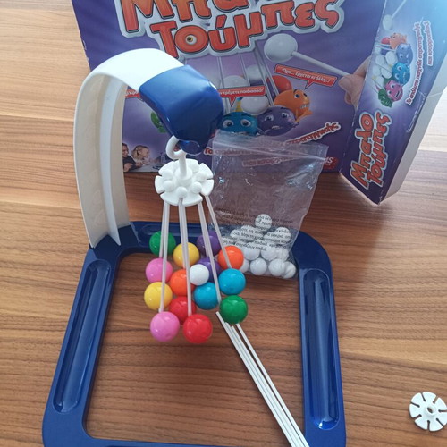 Balotoumpes board game used, strategy and balance