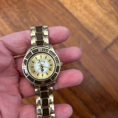 U.S. Polo Assn. women's watch used, gold with black bezel