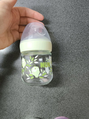 Small glass baby bottle like new with temperature indicator