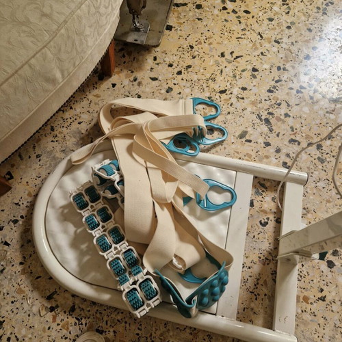 Massage and passive exercise device with rollers and straps like new