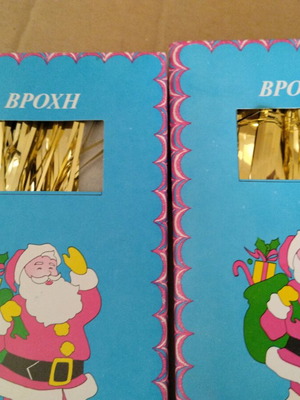 Vintage Christmas tinsel in red, gold and silver