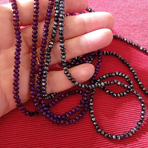 Package. Two long necklaces, in two shades.