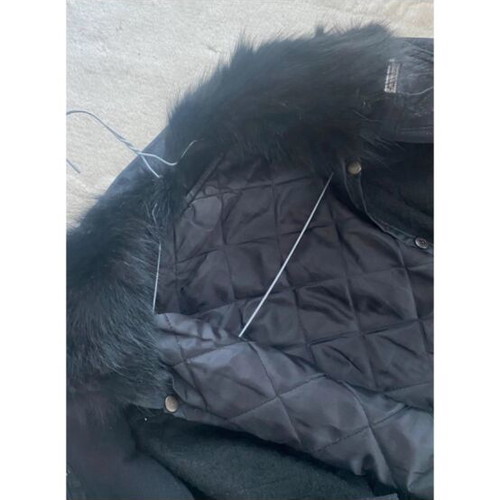 Short black reversible jacket with faux fur cuffs