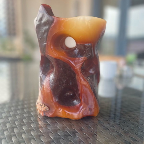 Handmade KHIROS candle like new, brown color with tealight holder