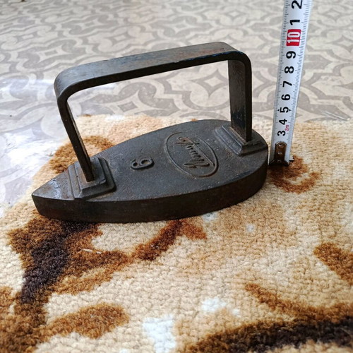 Old cast iron iron used