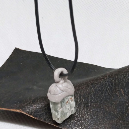 Pendant made of natural stone and polymer clay, tribal style