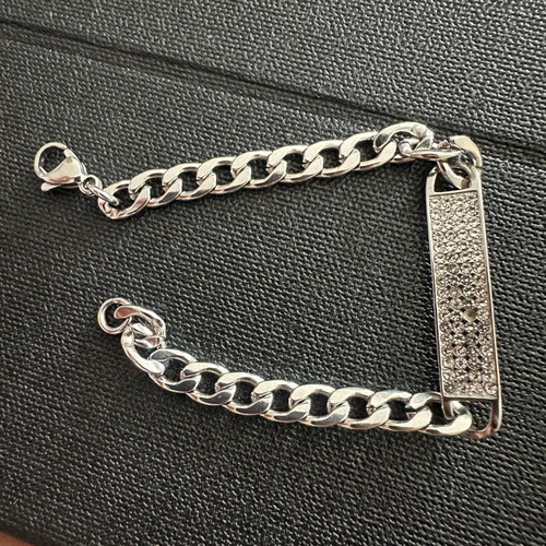 Silver identity bracelet with rhinestones, curb chain, without one rhinestone, 17-18 cm