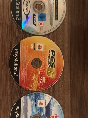 PlayStation 2 games pack of 3 used, Happy Feet, PES 6, WWE SmackDown vs. Raw 2010