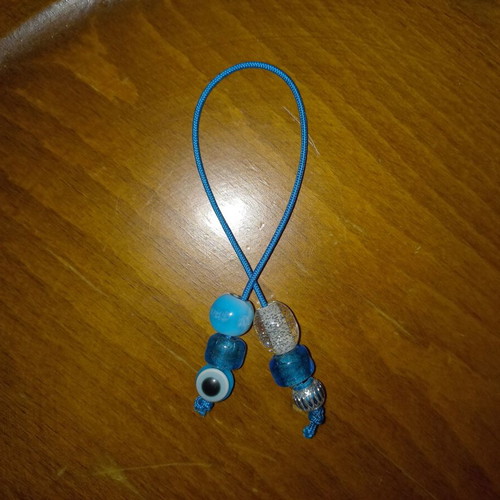 Small blue worry beads with eye stones