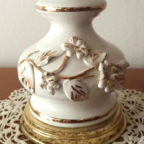 Vintage porcelain table lamp with fabric white shade and fringes used