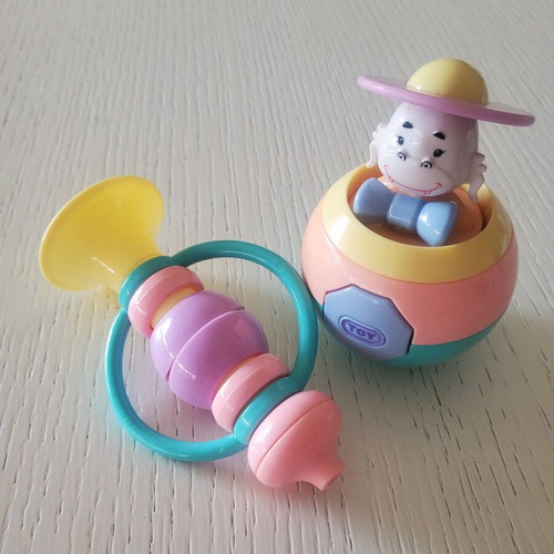 Baby toys ball and horn like new in pastel colors