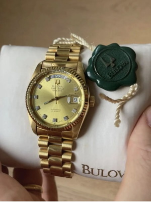 Bulova Super Seville wristwatch with diamond, gold color