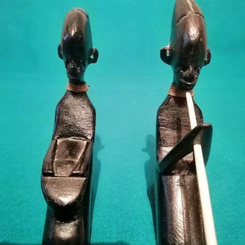 Ebony woodcarving set used, two African figures playing musical instruments