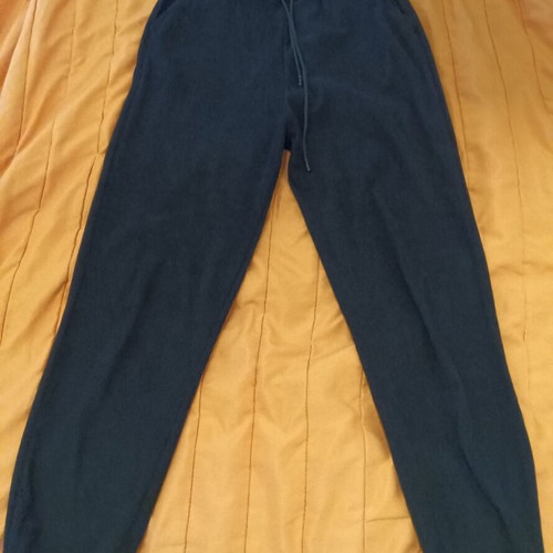 Velvet women's pants used, size L, black with pockets and elastic cuffs