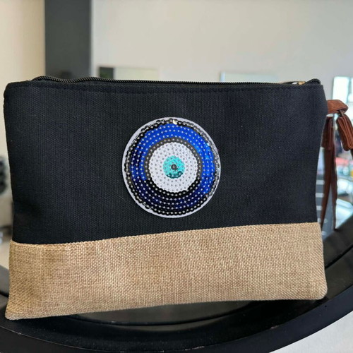 Black clutch bag with blue eye and leather strap new