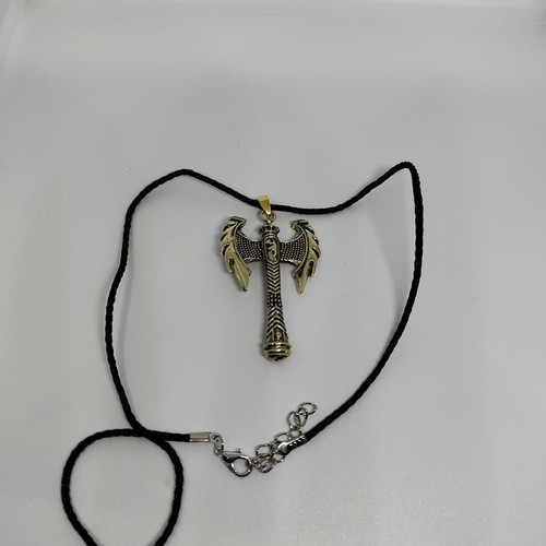 Pendant Double Axe like new, gold-colored steel with black cord