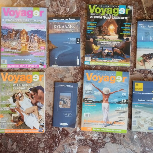 Voyager magazines and travel guides used, pack of five magazines and four guides