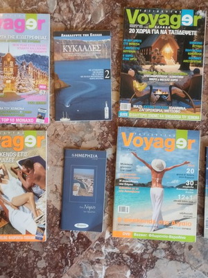 Voyager magazines and travel guides used, pack of five magazines and four guides