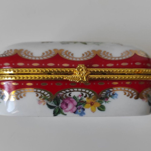 Limoges porcelain trinket box like new with floral design