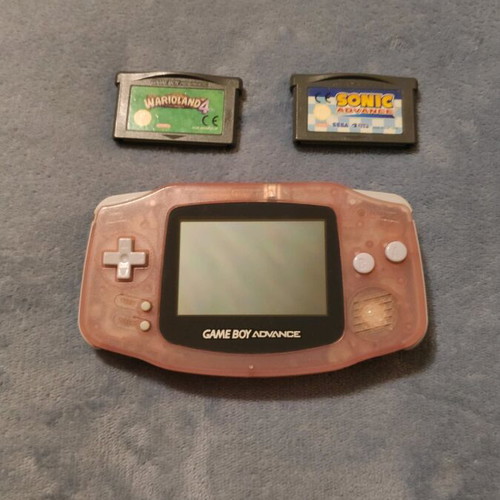 Nintendo Gameboy Advance Fuchsia like new with Warioland 4 and Sonic Advance