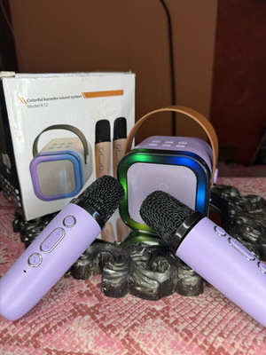 Σετ Karaoke K12 με 2 μικρόφωνα λιλά και ηχείο