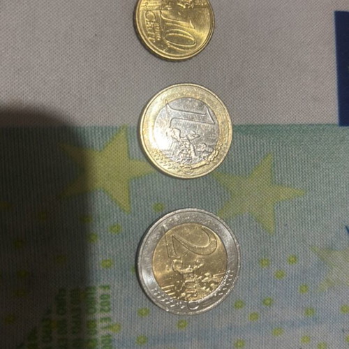 Set of three euro coins used