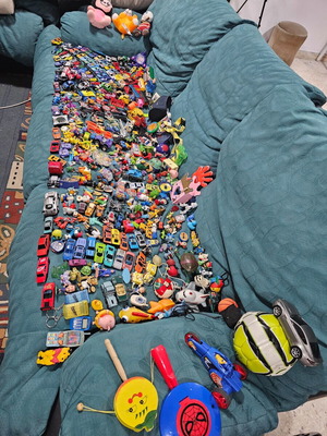 Pack of used children's and collectible toys with cars and figures