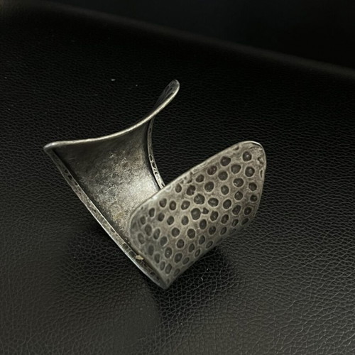 Hammered metal bracelet, silver color