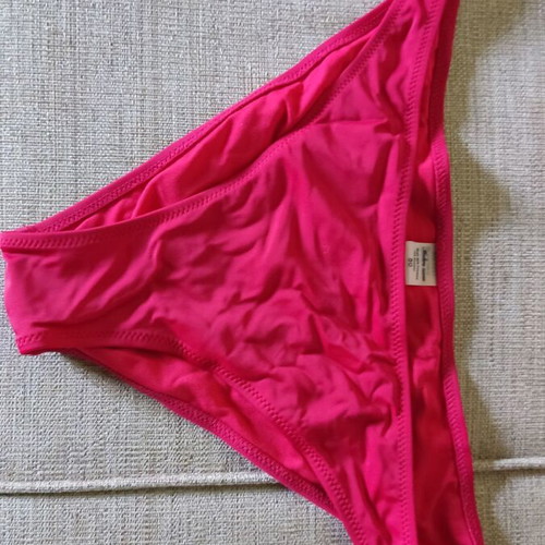 Red swimsuit size 50 like new, side tie
