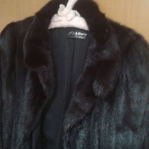 Fur like new, black