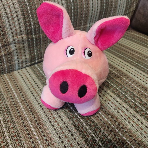 Plush pig used with velvet texture and curled tail