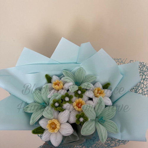 Delicate bouquet of daffodils and lilies custom made in pastel colors